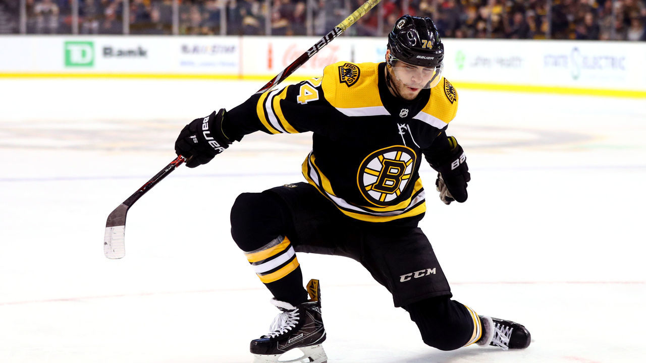 BOSTON, MA - JANUARY 6: Jake DeBrusk #74 of the Boston Bruins celebrates after scoring against the Carolina Hurricanes during the first period at TD Garden on January 6, 2018 in Boston, Massachusetts.