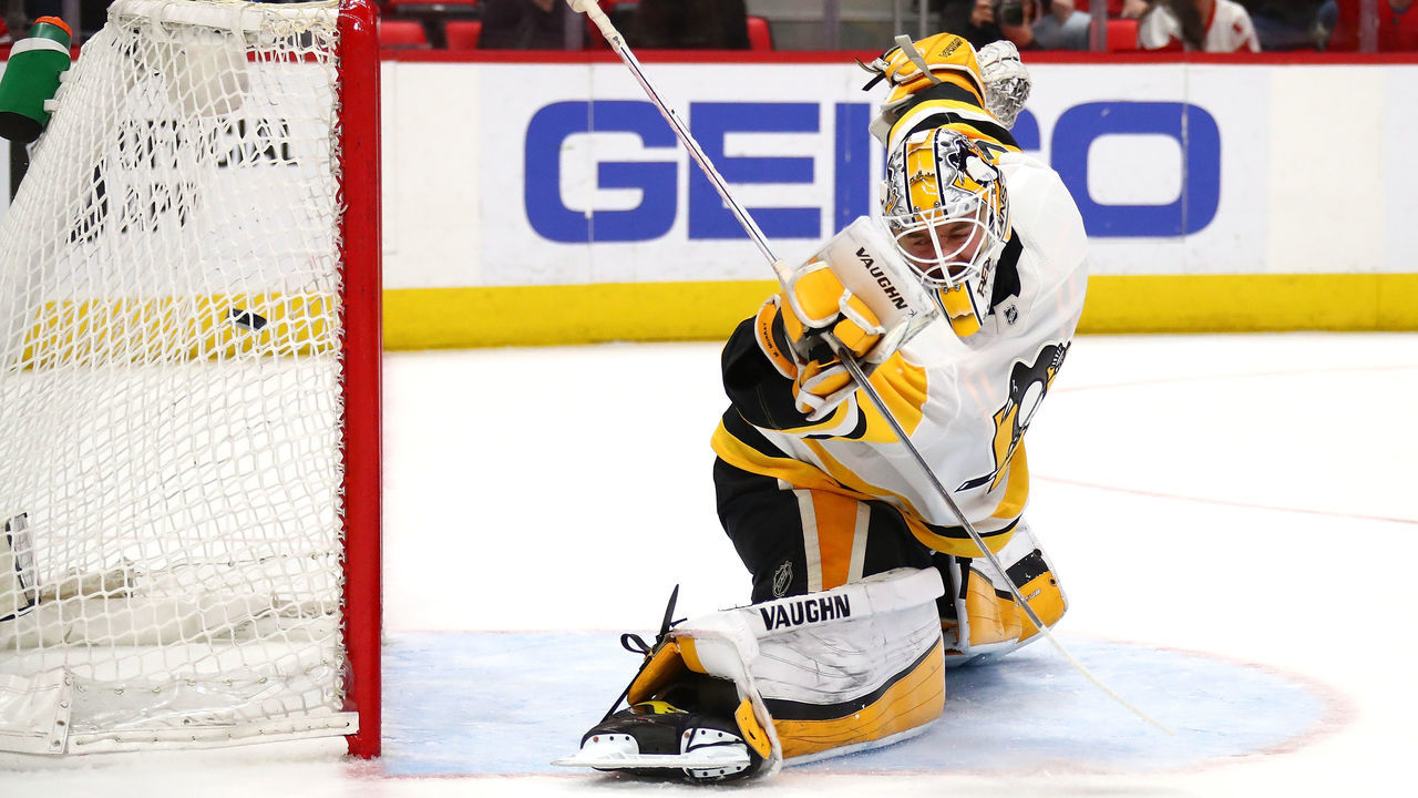 DETROIT, MI - MARCH 27: Matt Murray #30 of the Pittsburgh Penguins watches a second period goal go past him while playing the Detroit Red Wings at Little Caesars Arena on March 27, 2018 in Detroit, Michigan.