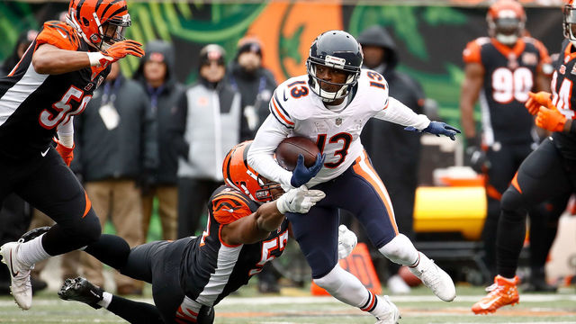 CINCINNATI, OH - DECEMBER 10: Kendall Wright #13 of the Chicago Bears breaks a tackle from Vincent Rey #57 of the Cincinnati Bengals during the first half at Paul Brown Stadium on December 10, 2017 in Cincinnati, Ohio.