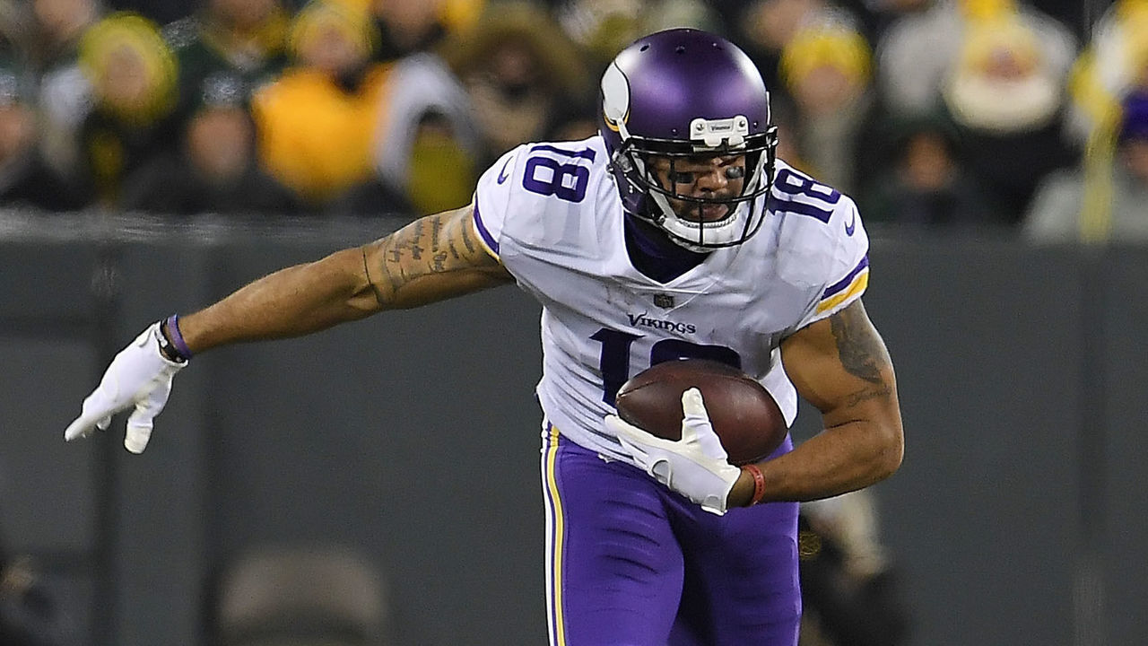 GREEN BAY, WI - DECEMBER 23: Michael Floyd #18 of the Minnesota Vikings is brought down by Josh Jones #27 of the Green Bay Packers during the second quarter of a game at Lambeau Field on December 23, 2017 in Green Bay, Wisconsin.
