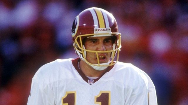 Washington Redskins quarterback Mark Rypien on the field during a game against the Chiefs. Mandatory Credit: Earl Richardson/ALLSPORT