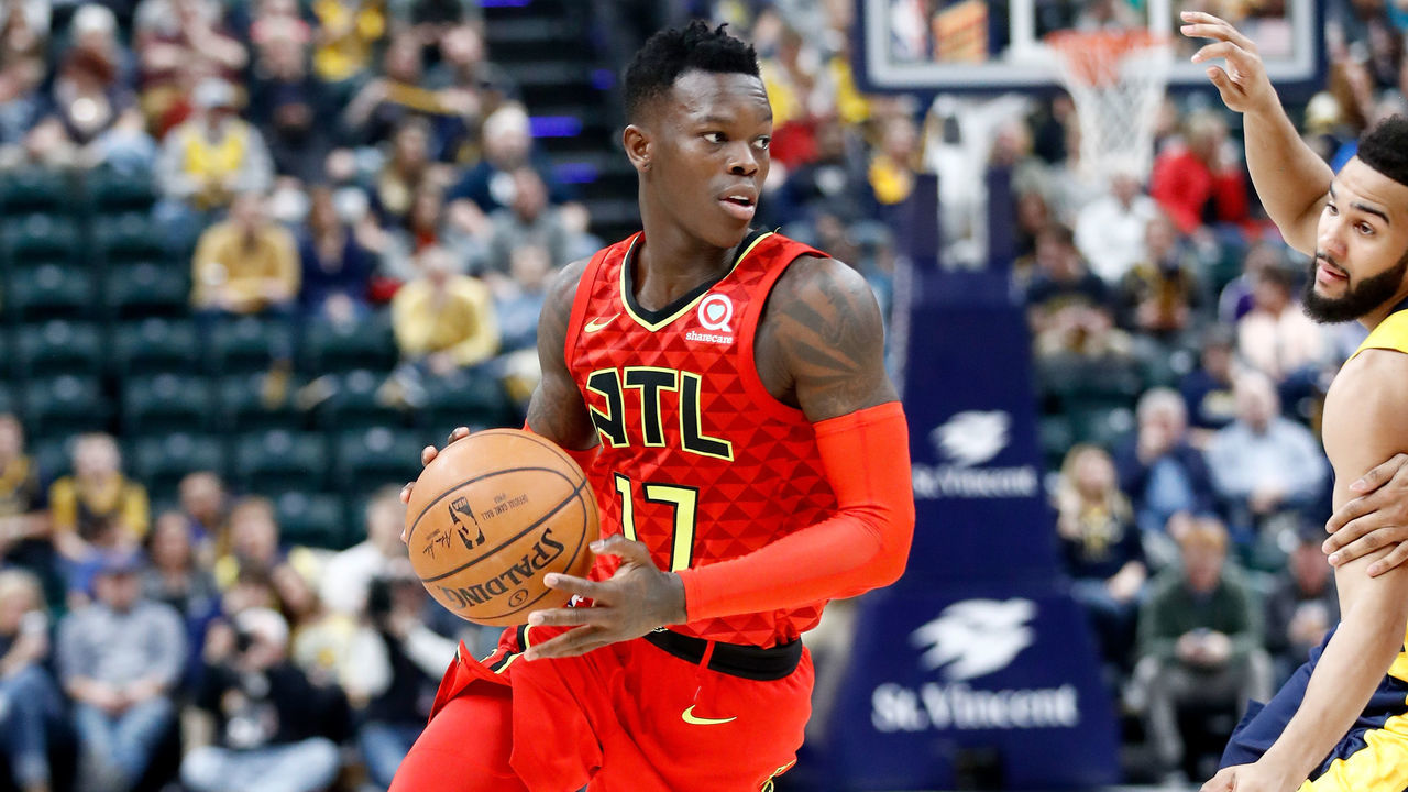 INDIANAPOLIS, IN - FEBRUARY 23: Dennis Schroder #17 of the Atlanta Hawks dribbles the ball against the Indiana Pacers during the game at Bankers Life Fieldhouse on February 23, 2018 in Indianapolis, Indiana.