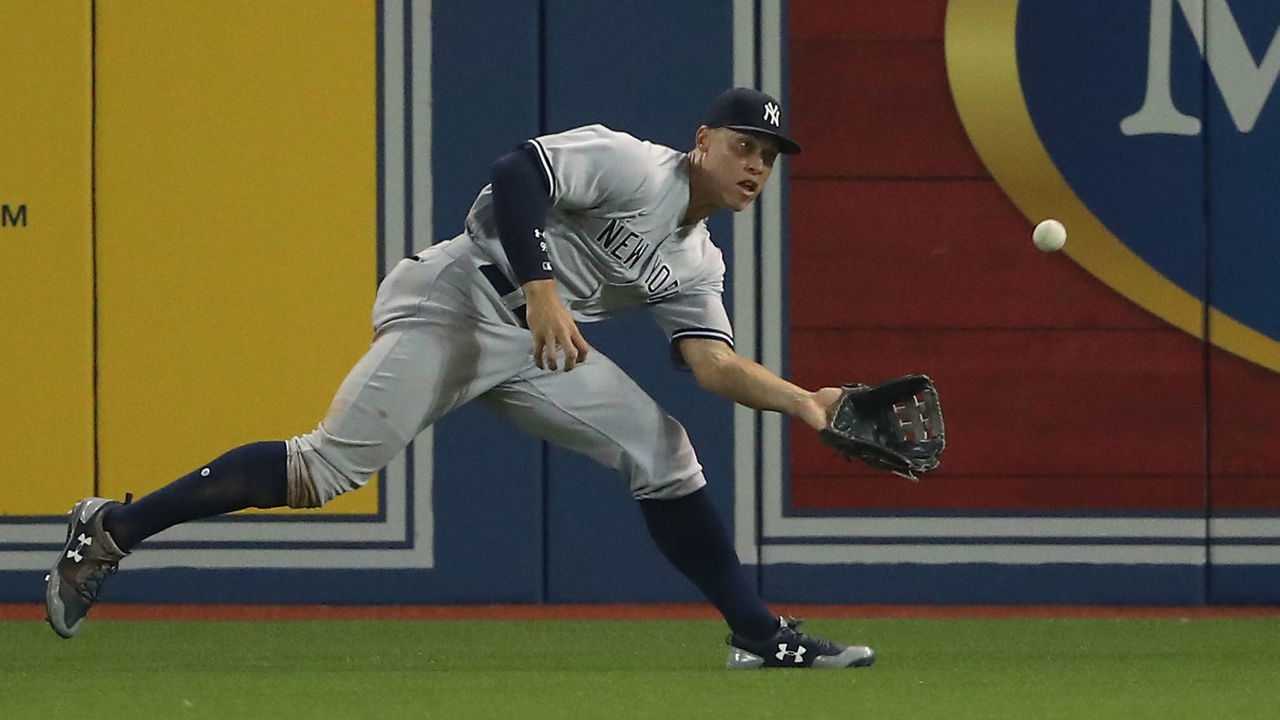 TORONTO, ON - AUGUST 8: Aaron Judge #99 of the New York Yankees makes a running shoestring catch in the seventh inning during MLB game action against the Toronto Blue Jays at Rogers Centre on August 8, 2017 in Toronto, Canada.