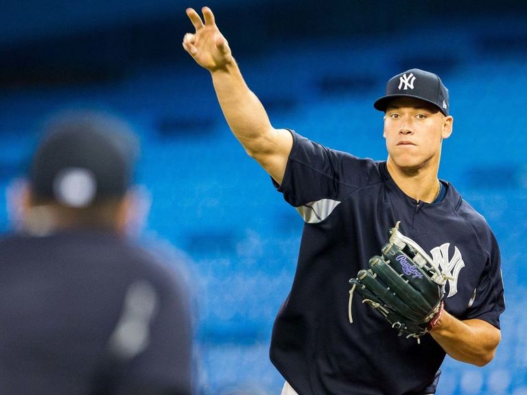 At 6foot7, Judge to tie MLB record for tallest center fielder
