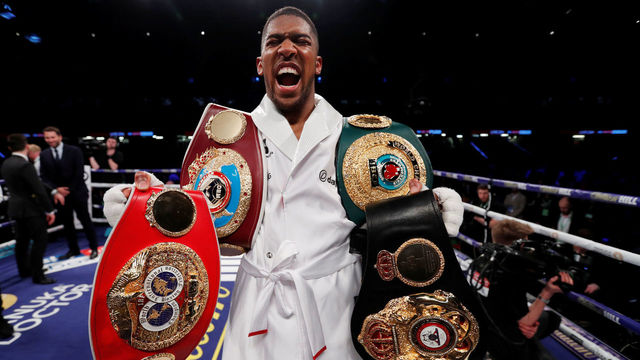 Joshua unifies 3 heavyweight belts with decision win over Parker