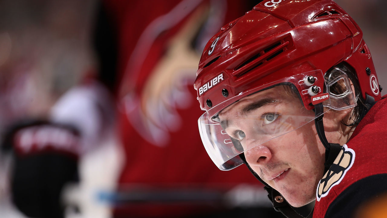 GLENDALE, AZ - JANUARY 04: Clayton Keller #9 of the Arizona Coyotes looks up from a face-off during the third period of the NHL game against the Nashville Predators at Gila River Arena on January 4, 2018 in Glendale, Arizona. The Coyotes defeated the Predators 3-2 in overtime.