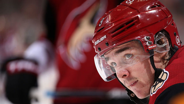 GLENDALE, AZ - JANUARY 04: Clayton Keller #9 of the Arizona Coyotes looks up from a face-off during the third period of the NHL game against the Nashville Predators at Gila River Arena on January 4, 2018 in Glendale, Arizona. The Coyotes defeated the Predators 3-2 in overtime.