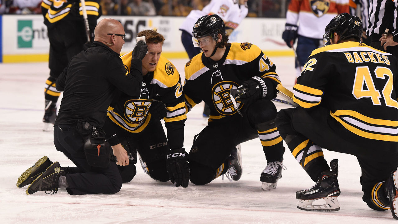 BOSTON, MA - MARCH 31: Riley Nash #20 of the Boston Bruins gets hurt during a play against the Florida Panthers at the TD Garden on March 31, 2018 in Boston, Massachusetts.