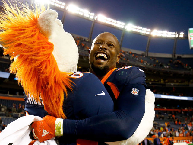DENVER, CO - DECEMBER 10: Outside linebacker Von Miller #58 of the Denver Broncos celebrates with Miles the mascot after a 23-0 victory against the New York Jets at Sports Authority Field at Mile High on December 10, 2017 in Denver, Colorado.