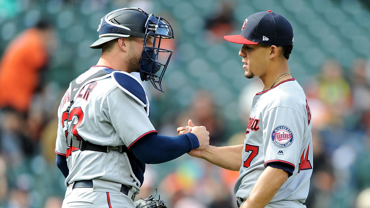 BALTIMORE, MD - APRIL 01: Jose Berrios #17 of the Minnesota Twins celebrates with Mitch Garver #23 after throwing a complete game shutout against the Baltimore Orioles at Oriole Park at Camden Yards on April 1, 2018 in Baltimore, Maryland. Minnesota won the game 7-0.