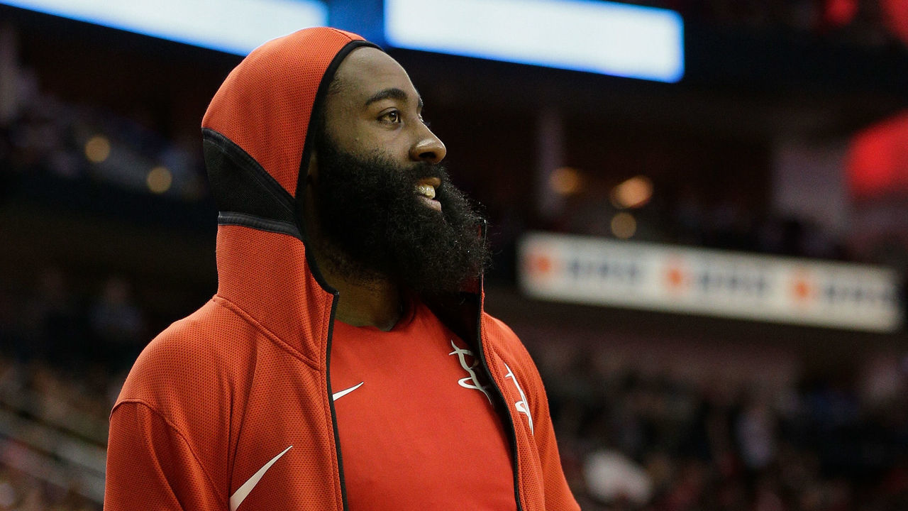 HOUSTON, TX - MARCH 12: James Harden #13 of the Houston Rockets looks on from the sidelines against the San Antonio Spurs at Toyota Center on March 12, 2018 in Houston, Texas.