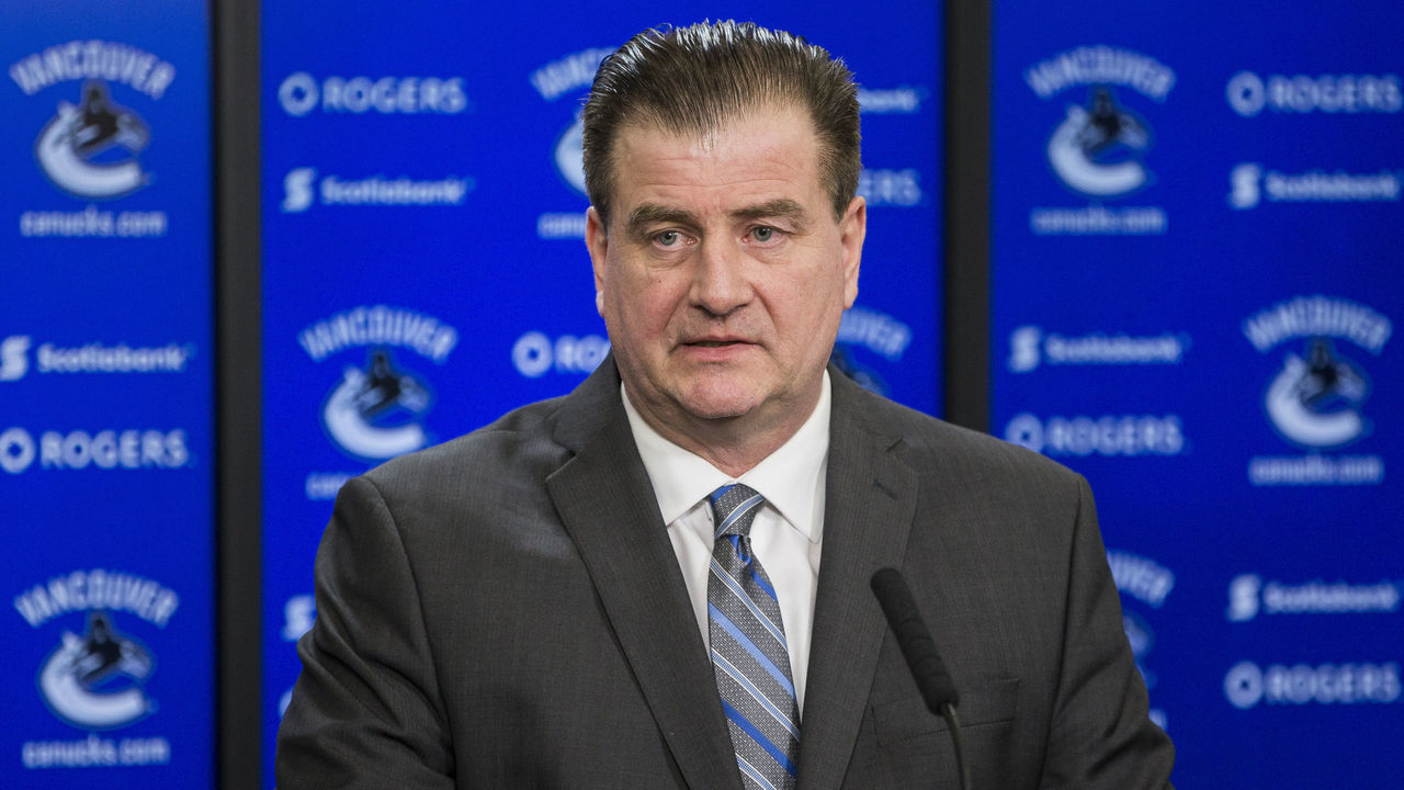 VANCOUVER, BC - FEBRUARY 28: Vancouver Canucks General Manager Jim Benning speaks to the media after a game between against the Vancouver Canucks and Detroit Red Wings. Benning was discussing the recent trades of Vancouver Canucks Left Wing Alexandre Burrows (14) and Vancouver Canucks Right Wing Jannik Hansen (36). February 28, 2017, at Rogers Arena in Vancouver, BC.