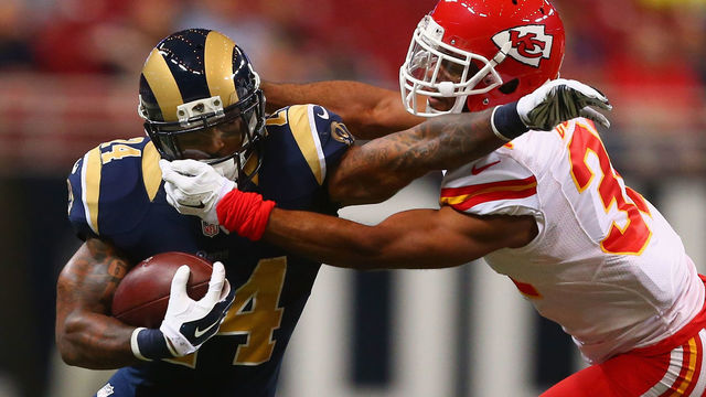 ST. LOUIS, MO - SEPTEMBER 3: Marcus Cooper #31 of the Kansas City Chiefs tackles Isaiah Pead #24 of the St. Louis Rams in the first quarter during a pre-season game at the Edward Jones Dome on September 3, 2014 in St. Louis, Missouri.