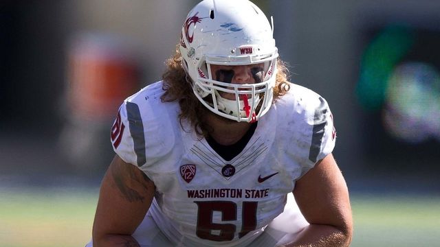 BERKELEY, CA - OCTOBER 03: Offensive lineman Cole Madison #61 of the Washington State Cougars lines up for a play against the California Golden Bears during the second quarter at California Memorial Stadium on October 3, 2015 in Berkeley, California. The California Golden Bears defeated the Washington State Cougars 34-28.