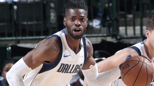 DALLAS, TX - MARCH 30: Nerlens Noel #3 of the Dallas Mavericks handles the ball against the Minnesota Timberwolves on March 30, 2018 at the American Airlines Center in Dallas, Texas. Mandatory Copyright Notice: Copyright 2018 NBAE