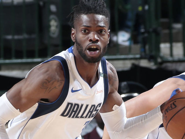 DALLAS, TX - MARCH 30: Nerlens Noel #3 of the Dallas Mavericks handles the ball against the Minnesota Timberwolves on March 30, 2018 at the American Airlines Center in Dallas, Texas. Mandatory Copyright Notice: Copyright 2018 NBAE