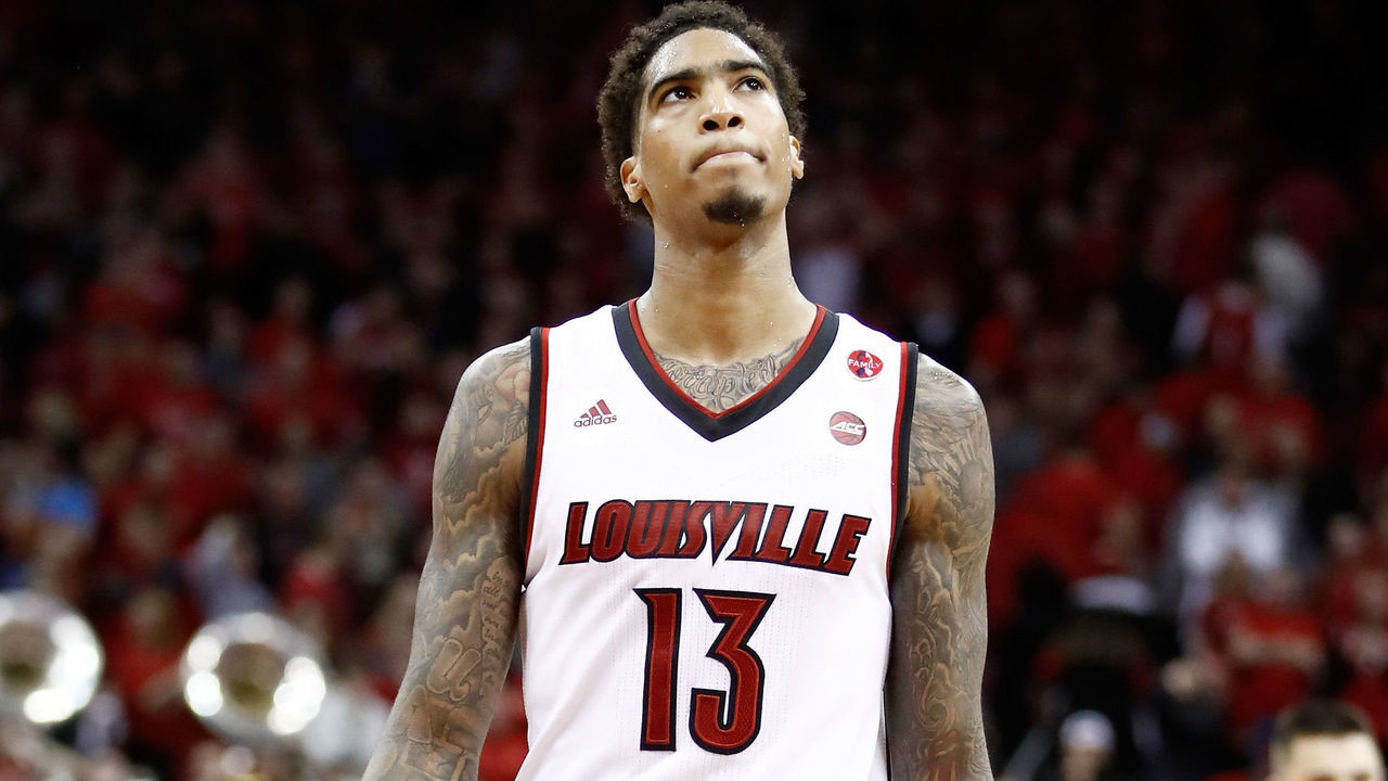 LOUISVILLE, KY - MARCH 01: Ray Spalding #13 of the Louisville Cardinals walks off of the court after a three point basket at the buzzer by De'Andre Hunter #12 of the Virginia Cavaliers beat the Cardinals 67-66 at KFC YUM! Center on March 1, 2018 in Louisville, Kentucky.
