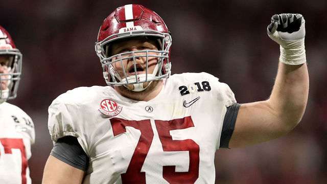 ATLANTA, GA - JANUARY 08: Bradley Bozeman #75 of the Alabama Crimson Tide celebrates the strart of the fourth quarter against the Georgia Bulldogs in the CFP National Championship presented by AT&T at Mercedes-Benz Stadium on January 8, 2018 in Atlanta, Georgia.