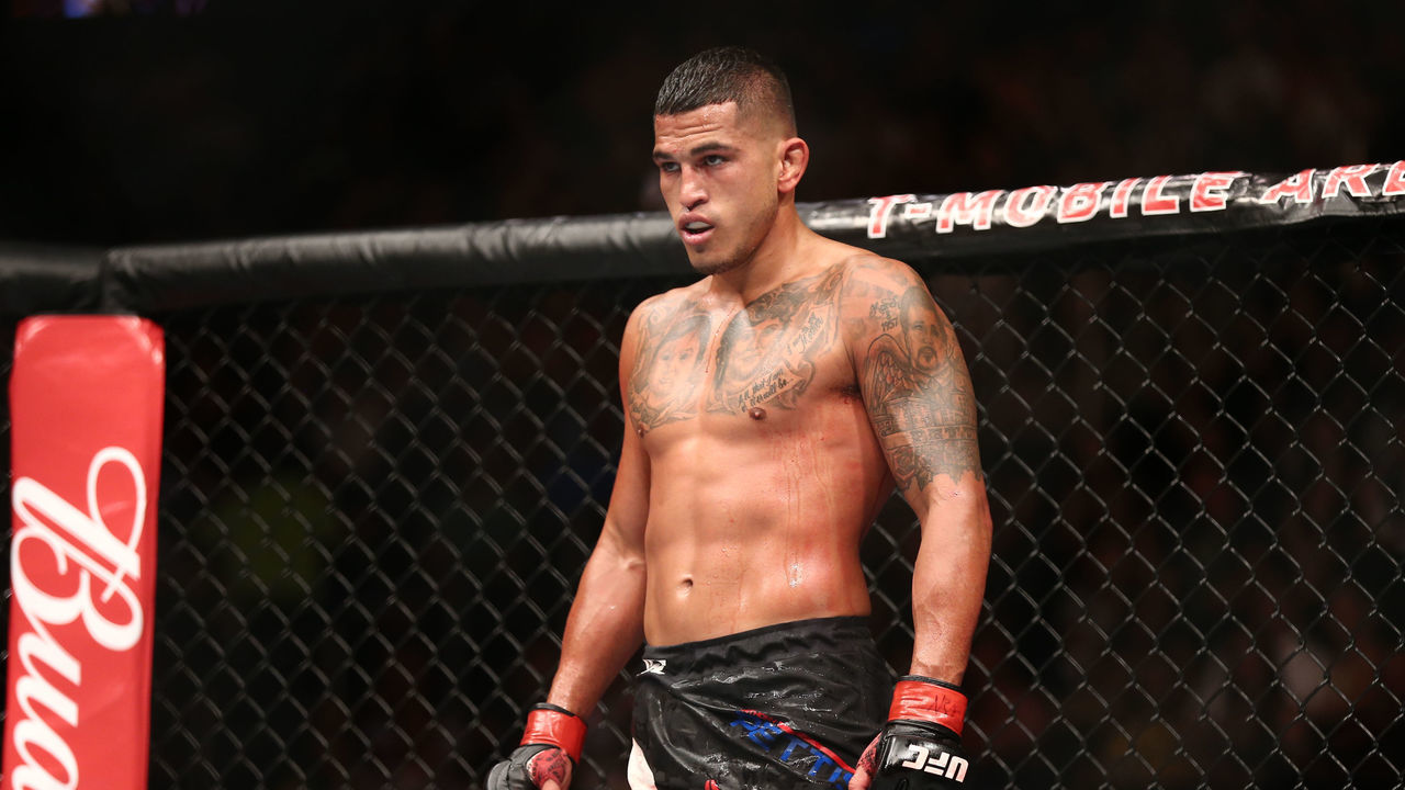 LAS VEGAS, NV - JULY 9: (L-R) Anthony Pettis stands in the Octagon between rounds of his bout against Jim Miller in their lightweight bout during the UFC 213 event at T-Mobile Arena on July 9, 2017 in Las Vegas, Nevada.
