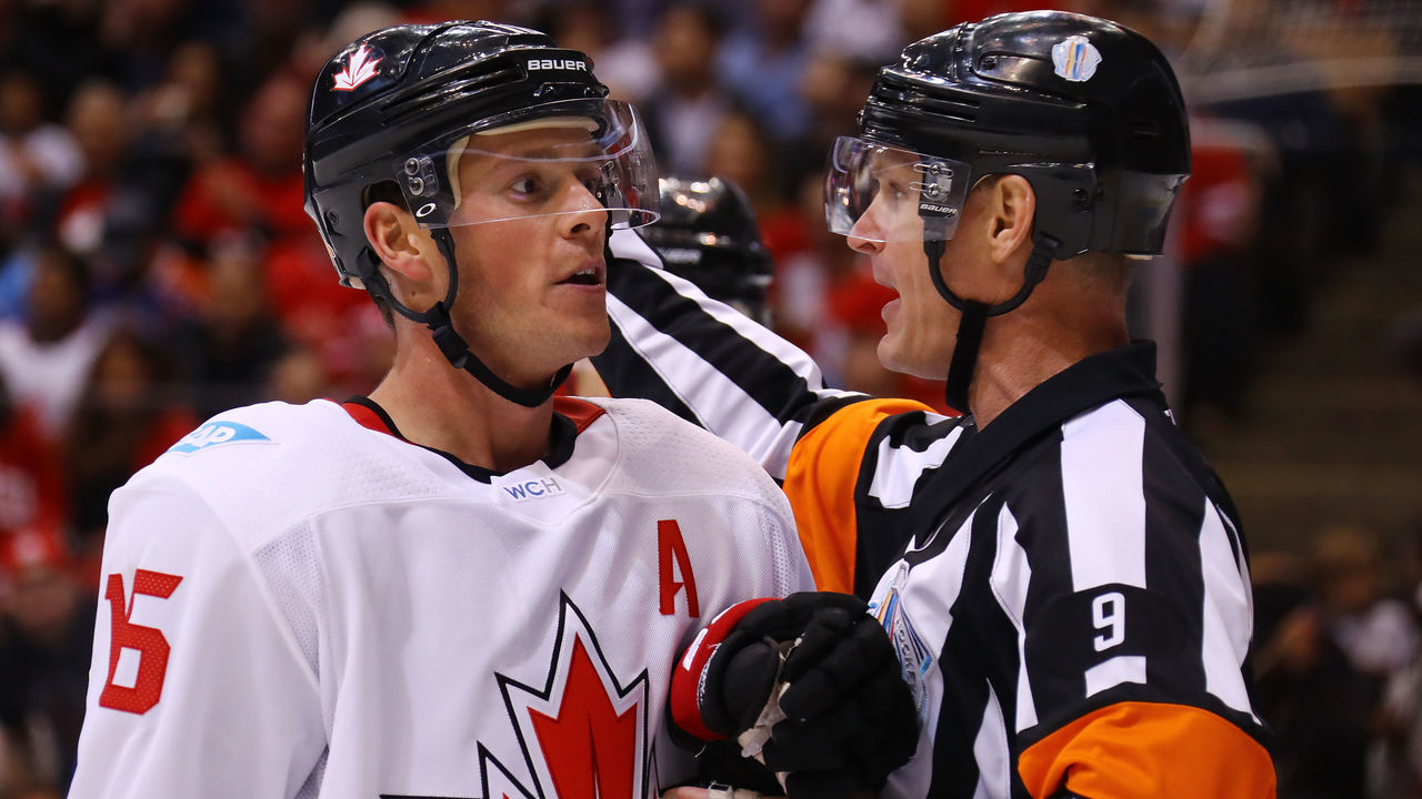 TORONTO, ON - SEPTEMBER 29: Jonathan Toews #16 of Team Canada discusses a call with Referee Dan O'Rourke #9 against Team Europe during the second period during Game Two of the World Cup of Hockey final series at the Air Canada Centre on September 29, 2016 in Toronto, Canada.