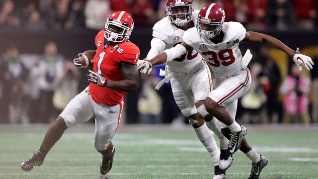 ATLANTA, GA - JANUARY 08: Sony Michel #1 of the Georgia Bulldogs runs the ball during the first quarter against the Alabama Crimson Tide in the CFP National Championship presented by AT&T at Mercedes-Benz Stadium on January 8, 2018 in Atlanta, Georgia.