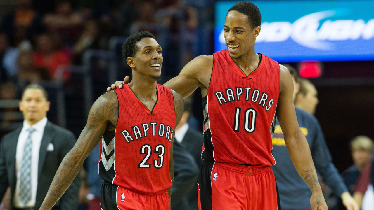CLEVELAND, OH - NOVEMBER 22: Louis Williams #23 celebrates with DeMar DeRozan #10 of the Toronto Raptors during the second half at Quicken Loans Arena on November 22, 2014 in Cleveland, Ohio. The Raptors defeated the Cavaliers 110-93.