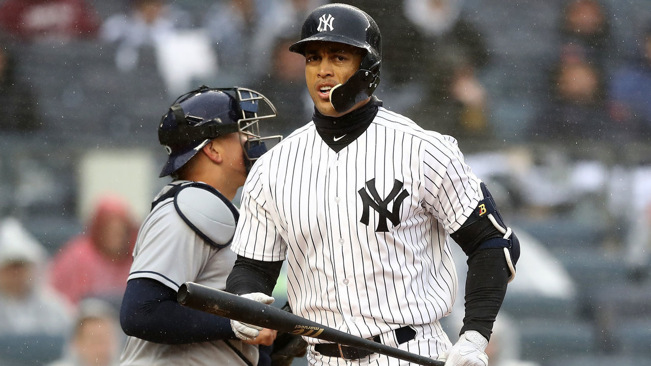 NEW YORK, NY - APRIL 03: Giancarlo Stanton #27 of the New York Yankees strikes out in the third inning against the Tampa Bay Rays during Opening Day at Yankee Stadium on April 3, 2018 in the Bronx borough of New York City.
