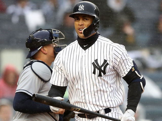 NEW YORK, NY - APRIL 03: Giancarlo Stanton #27 of the New York Yankees strikes out in the third inning against the Tampa Bay Rays during Opening Day at Yankee Stadium on April 3, 2018 in the Bronx borough of New York City.