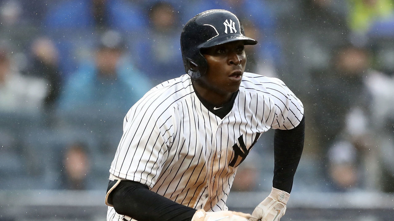 NEW YORK, NY - APRIL 03: Didi Gregorius #18 of the New York Yankees watches his three run home run in the third inning against the Tampa Bay Rays during Opening Day at Yankee Stadium on April 3, 2018 in the Bronx borough of New York City.