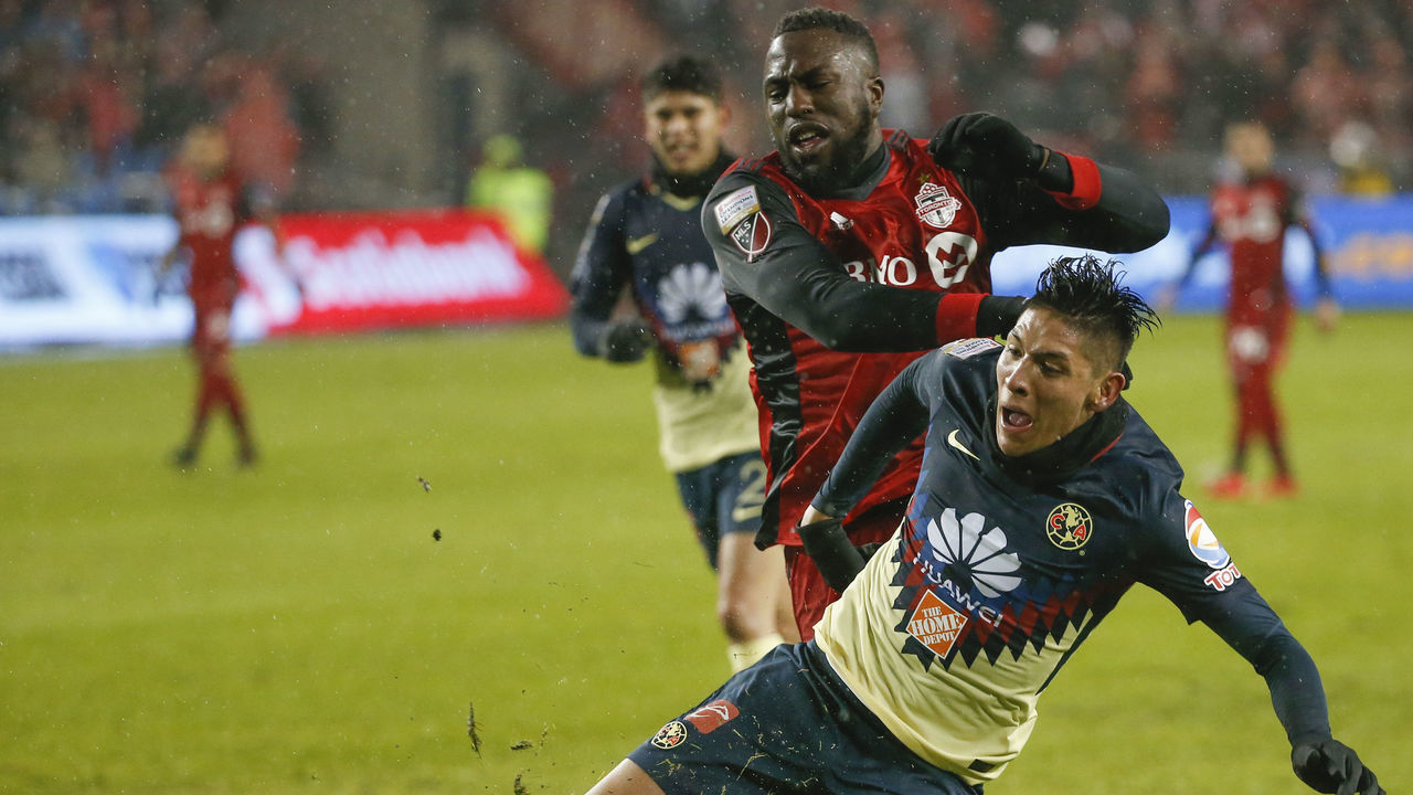 TORONTO, ON - APRIL 3: América defender Edson Alvarez (4) does his best to slow down Toronto FC forward Jozy Altidore (17). Toronto FC vs Club America (Mexico) during 1st half action in CONCACAF semi-final play at BMO Field. This is the first leg of the semi-final. Toronto Star/Rick Madonik (Rick Madonik/Toronto Star via Getty Images)
