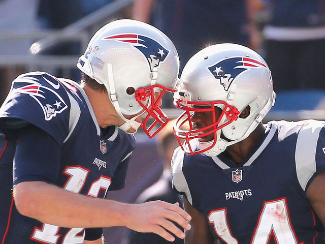 FOXBORO, MA - SEPTEMBER 24: Tom Brady #12 reacts with Brandin Cooks #14 of the New England Patriots after a touchdown during the third quarter of a game against the Houston Texans at Gillette Stadium on September 24, 2017 in Foxboro, Massachusetts.