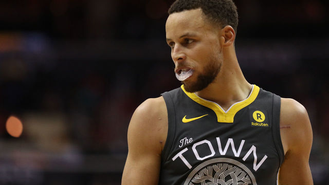 WASHINGTON, DC - FEBRUARY 28: Stephen Curry #30 of the Golden State Warriors looks on against the Washington Wizards at Capital One Arena on February 28, 2018 in Washington, DC.