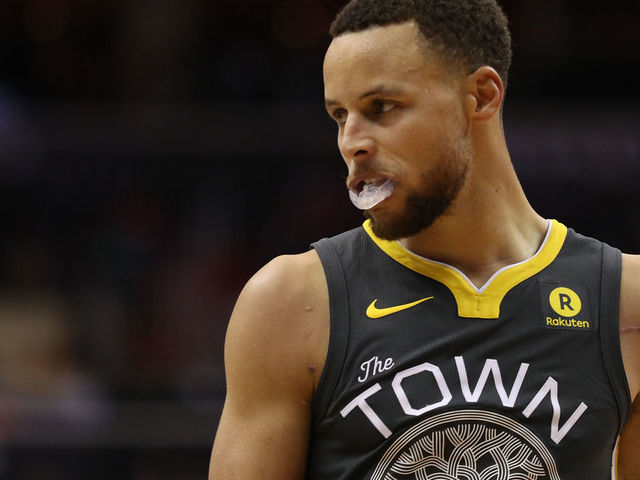WASHINGTON, DC - FEBRUARY 28: Stephen Curry #30 of the Golden State Warriors looks on against the Washington Wizards at Capital One Arena on February 28, 2018 in Washington, DC.
