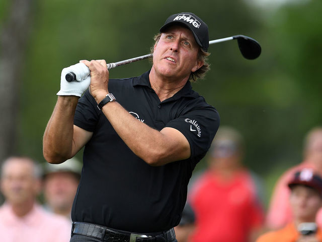 HUMBLE, TX - APRIL 01: Phil Mickelson hits his second shot on the eighth hole during the final round of the Houston Open at the Golf Club of Houston on April 1, 2018 in Humble, Texas.