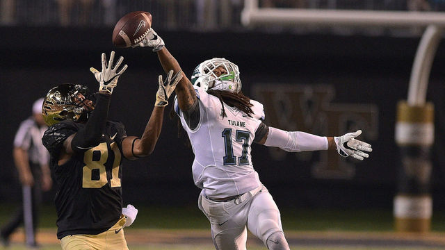 WINSTON-SALEM, NC - SEPTEMBER 01: Parry Nickerson #17 of the Tulane Green Wave breaks up a pass intended for Steven Claude #81 of the Wake Forest Demon Deacons at BB&T Field on September 1, 2016 in Winston-Salem, North Carolina. Wake Forest defeated Tulane 7-3.