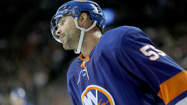 NEW YORK, NY - FEBRUARY 11: Johnny Boychuk #55 of the New York Islanders reacts after the game winning goal by Matthew Tkachuk #19 of the Calgary Flames in the last few minutes of play in the third period during their game at Barclays Center on February 11, 2018 in the Brooklyn borough of New York City.