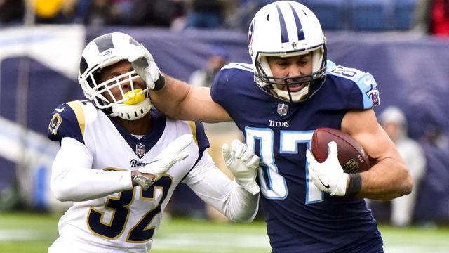 NASHVILLE, TN - DECEMBER 24: Wide Receiver Eric Decker #87 of the Tennessee Titans carries the ball against Corner Back Troy Hill #32 of the Los Angeles Rams at Nissan Stadium on December 24, 2017 in Nashville, Tennessee.