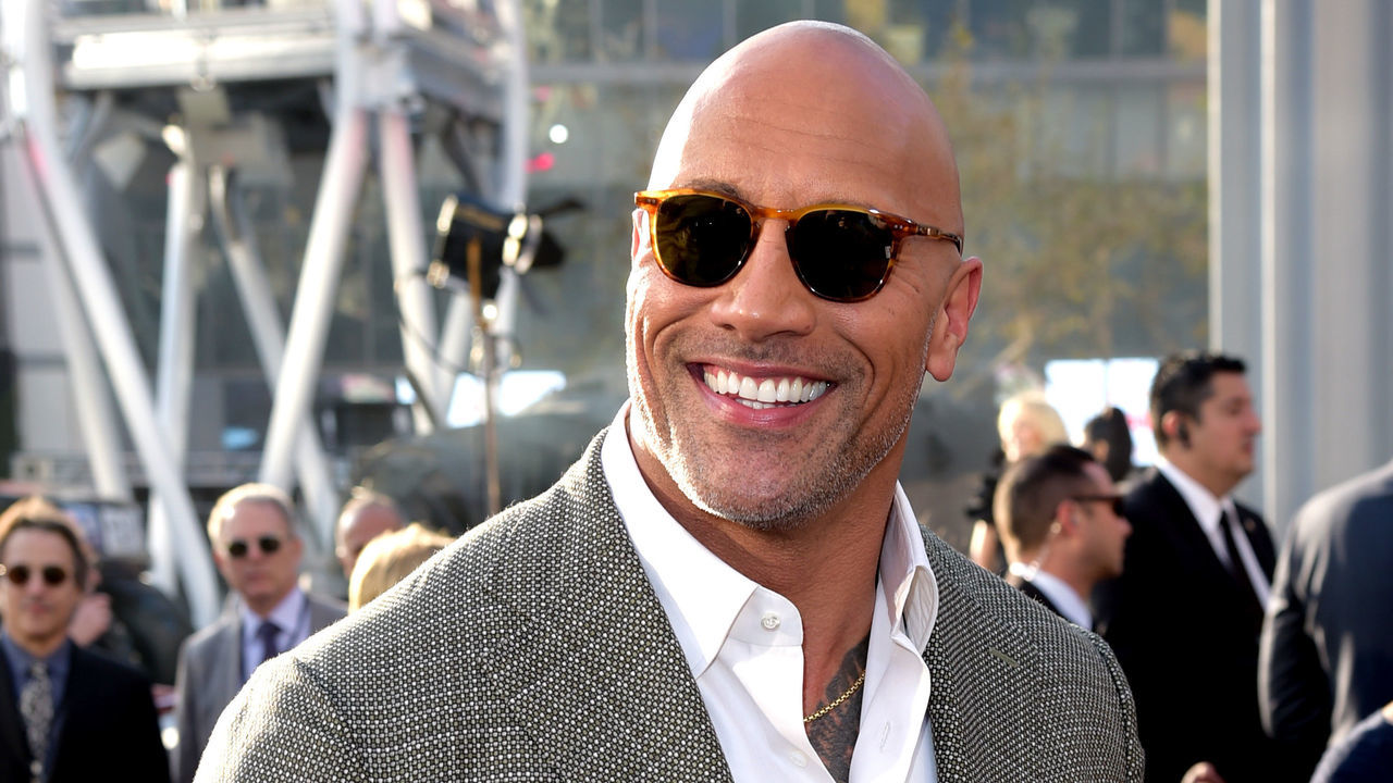 LOS ANGELES, CA - APRIL 04: Actor Dwayne Johnson arrives at the premiere of Warner Bros. Pictures' 'Rampage' at the Microsoft Theatre on April 4, 2018 in Los Angeles, California.