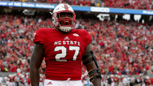 RALEIGH, NC - NOVEMBER 04: Justin Jones #27 of the North Carolina State Wolfpack reacts after a play against the Clemson Tigers walks during their game at Carter Finley Stadium on November 4, 2017 in Raleigh, North Carolina.
