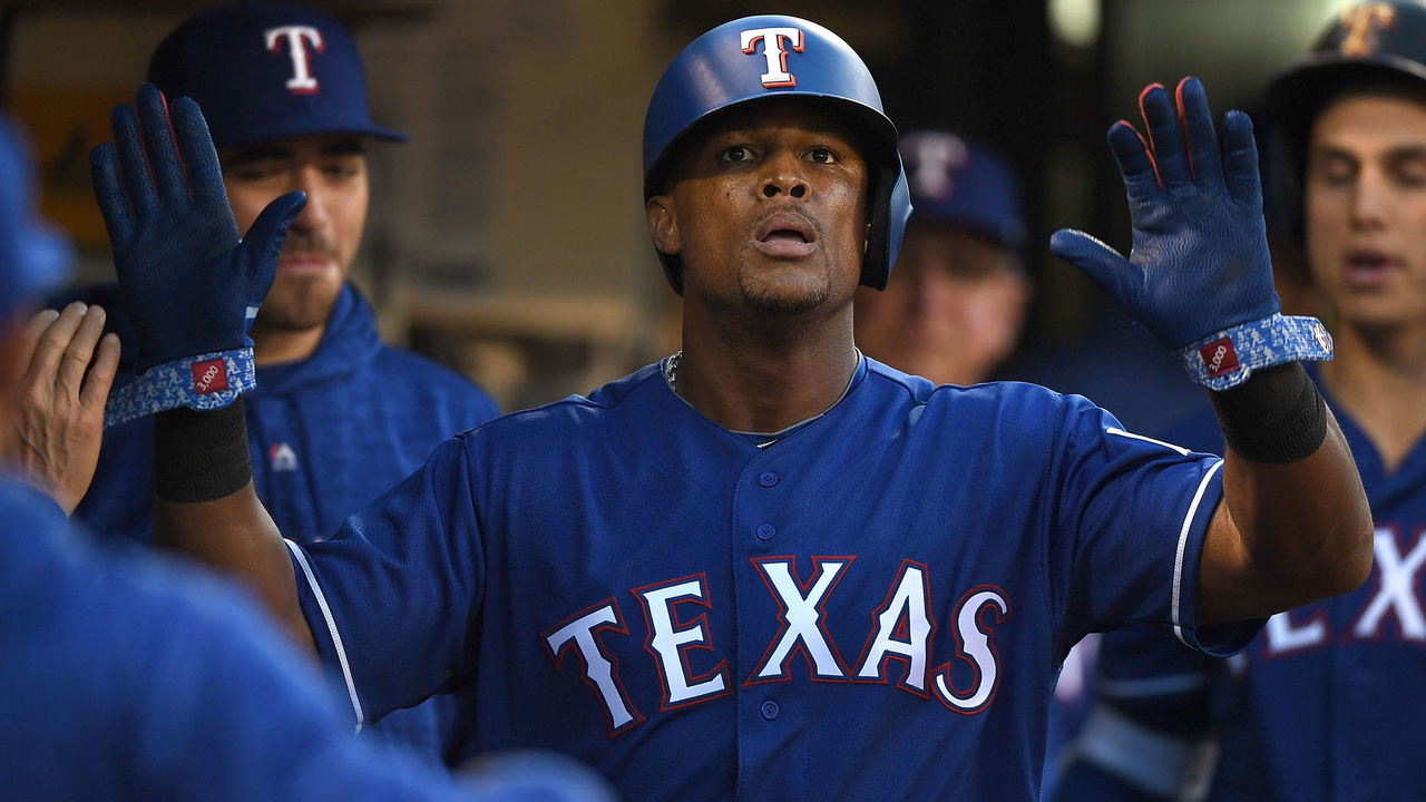 OAKLAND, CA - APRIL 03: Adrian Beltre #29 of the Texas Rangers is congratulated by teammates after he scored against the Oakland Athletics at the Oakland Alameda Coliseum on April 3, 2018 in Oakland, California.