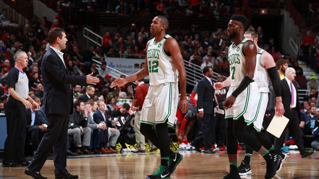 CHICAGO, IL - MARCH 5: Al Horford #42 and Brad Stevens of the Boston Celtics high five during the game against the Chicago Bulls on March 5, 2018 at the United Center in Chicago, Illinois. Mandatory Copyright Notice: Copyright 2018 NBAE