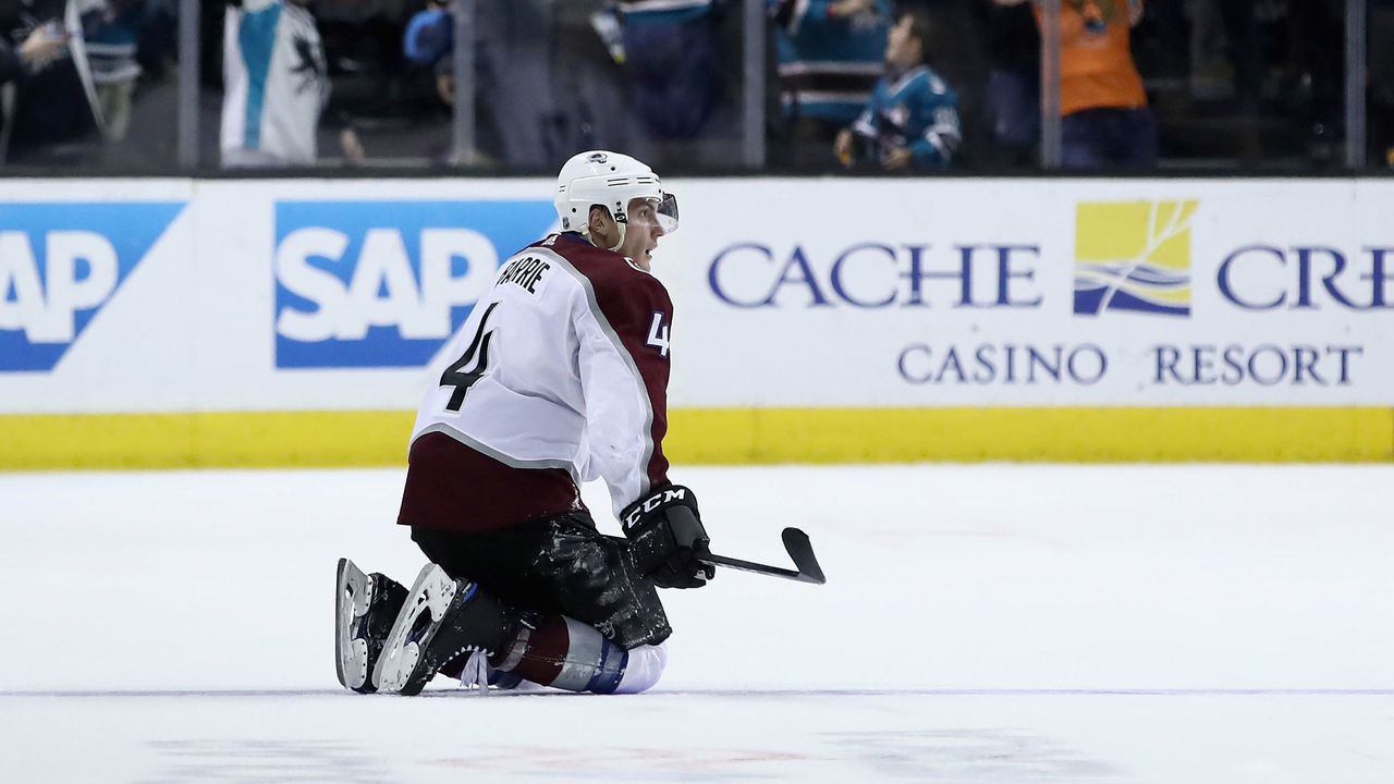 SAN JOSE, CA - APRIL 05: Tyson Barrie #4 of the Colorado Avalanche kneels on the ice after the San Jose Sharks scored to go up 4-2 with one second left in the game at SAP Center on April 5, 2018 in San Jose, California.