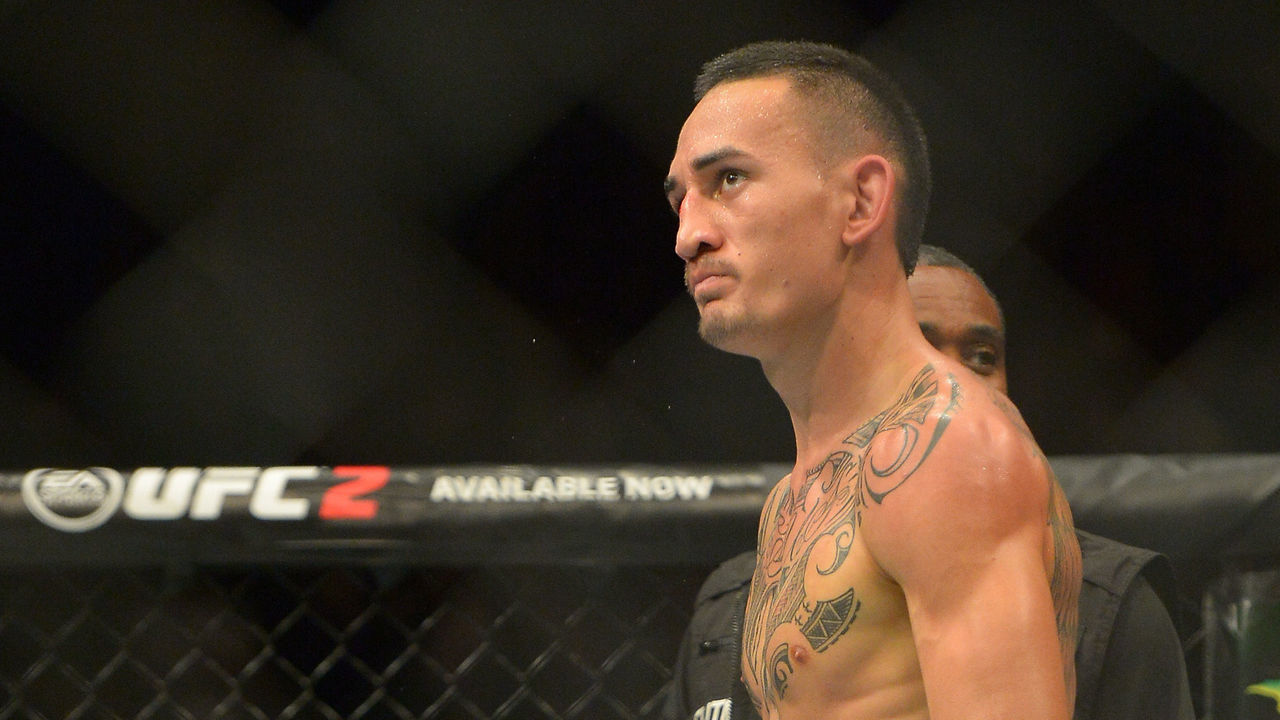 INGLEWOOD, CA - JUNE 04: Max Holloway in the cage after winning his featherweight bout at UFC 199 at The Forum on June 4, 2016 in Inglewood, California.