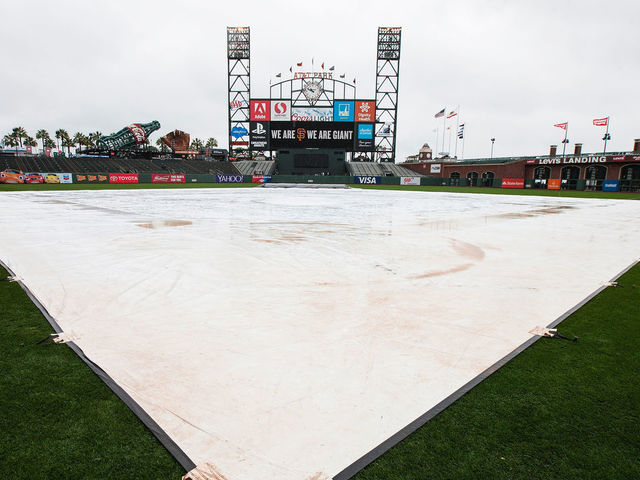 SAN FRANCISCO, CA - APRIL 09: General view of AT&T Park with a tarp covering the infield during a rain shower before the game between the San Francisco Giants and the Los Angeles Dodgers on April 9, 2016 in San Francisco, California.