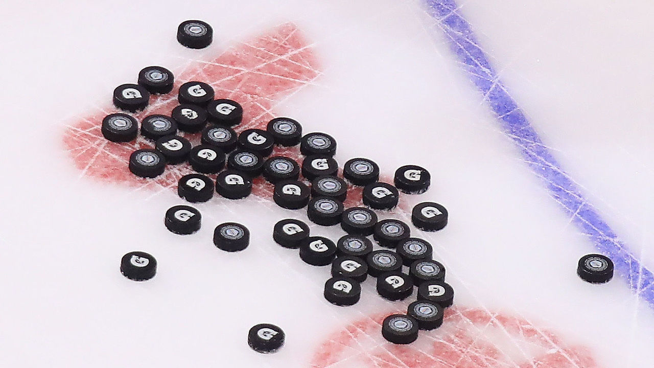 TORONTO, ON - SEPTEMBER 21: Pucks sit on the ice during warmups prior to the game between Team Sweden and Team North America at the World Cup of Hockey tournament at the Air Canada Centre on September 21, 2016 in Toronto, Canada.