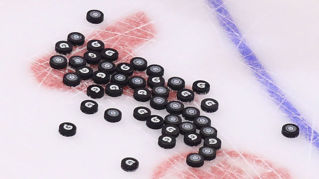 TORONTO, ON - SEPTEMBER 21: Pucks sit on the ice during warmups prior to the game between Team Sweden and Team North America at the World Cup of Hockey tournament at the Air Canada Centre on September 21, 2016 in Toronto, Canada.