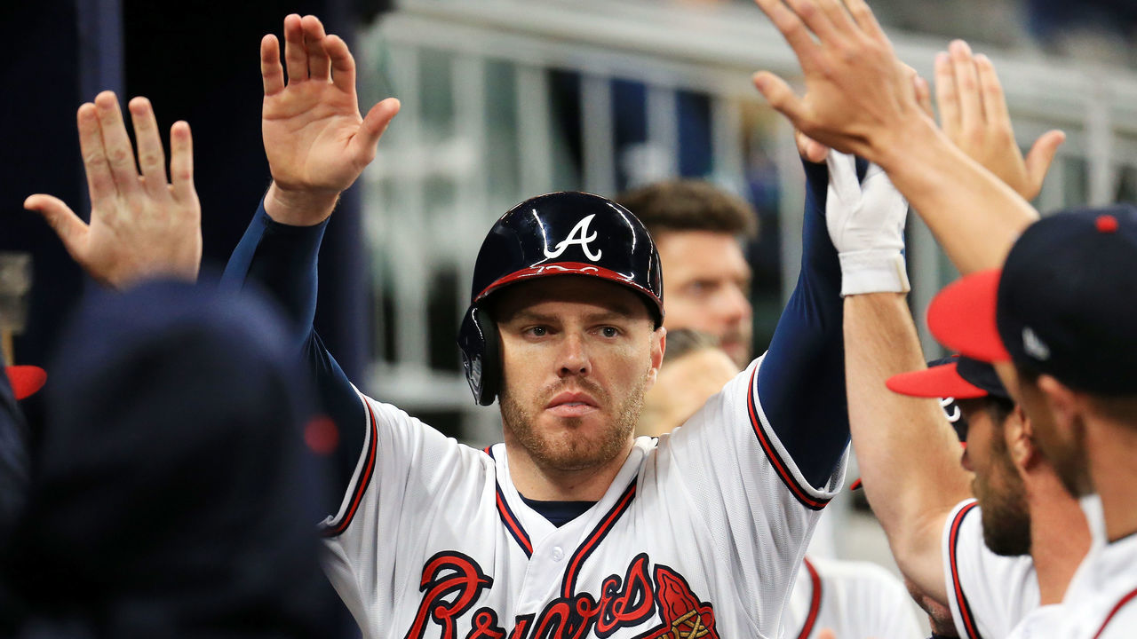 ATLANTA, GA - MARCH 30: Freddie Freeman #5 of the Atlanta Braves celebrates scoring during the eighth inning against the Philadelphia Phillies at SunTrust Park on March 30, 2018 in Atlanta, Georgia.