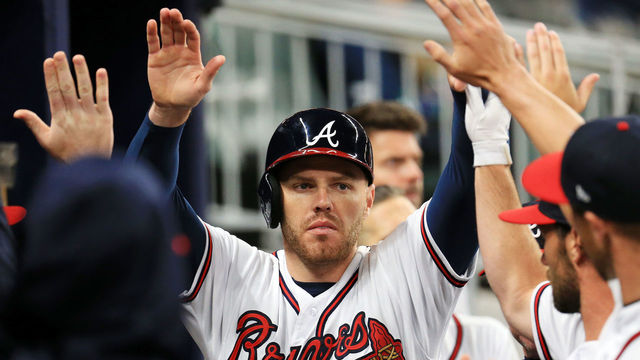 ATLANTA, GA - MARCH 30: Freddie Freeman #5 of the Atlanta Braves celebrates scoring during the eighth inning against the Philadelphia Phillies at SunTrust Park on March 30, 2018 in Atlanta, Georgia.