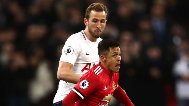 Tottenham Hotspur's Harry Kane (left) and Manchester United's Alexis Sanchez (right) battle for the ball during the Premier League match at Wembley Stadium, London.