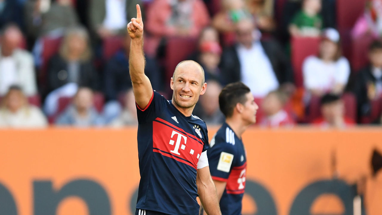 Bayern Munich's Dutch midfielder Arjen Robben reacts after his goal during the German first division Bundesliga football match FC Augsburg vs FC Bayern Munich in Augsburg, southern Germany, on April 7, 2018. / AFP PHOTO / Christof STACHE / RESTRICTIONS: DURING MATCH TIME: DFL RULES TO LIMIT THE ONLINE USAGE TO 15 PICTURES PER MATCH AND FORBID IMAGE SEQUENCES TO SIMULATE VIDEO. == RESTRICTED TO EDITORIAL USE == FOR FURTHER QUERIES PLEASE CONTACT DFL DIRECTLY AT + 49 69 650050